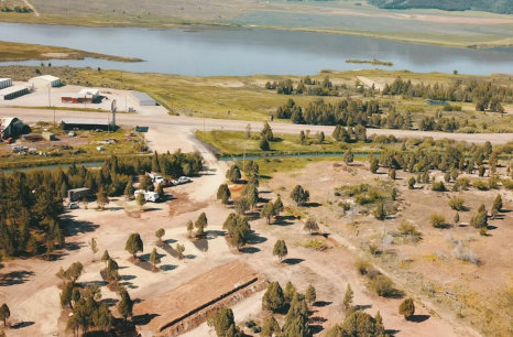 An aerial view of Soda Creek Campground in Soda Springs, Idaho, showing att the campsites and the pond.